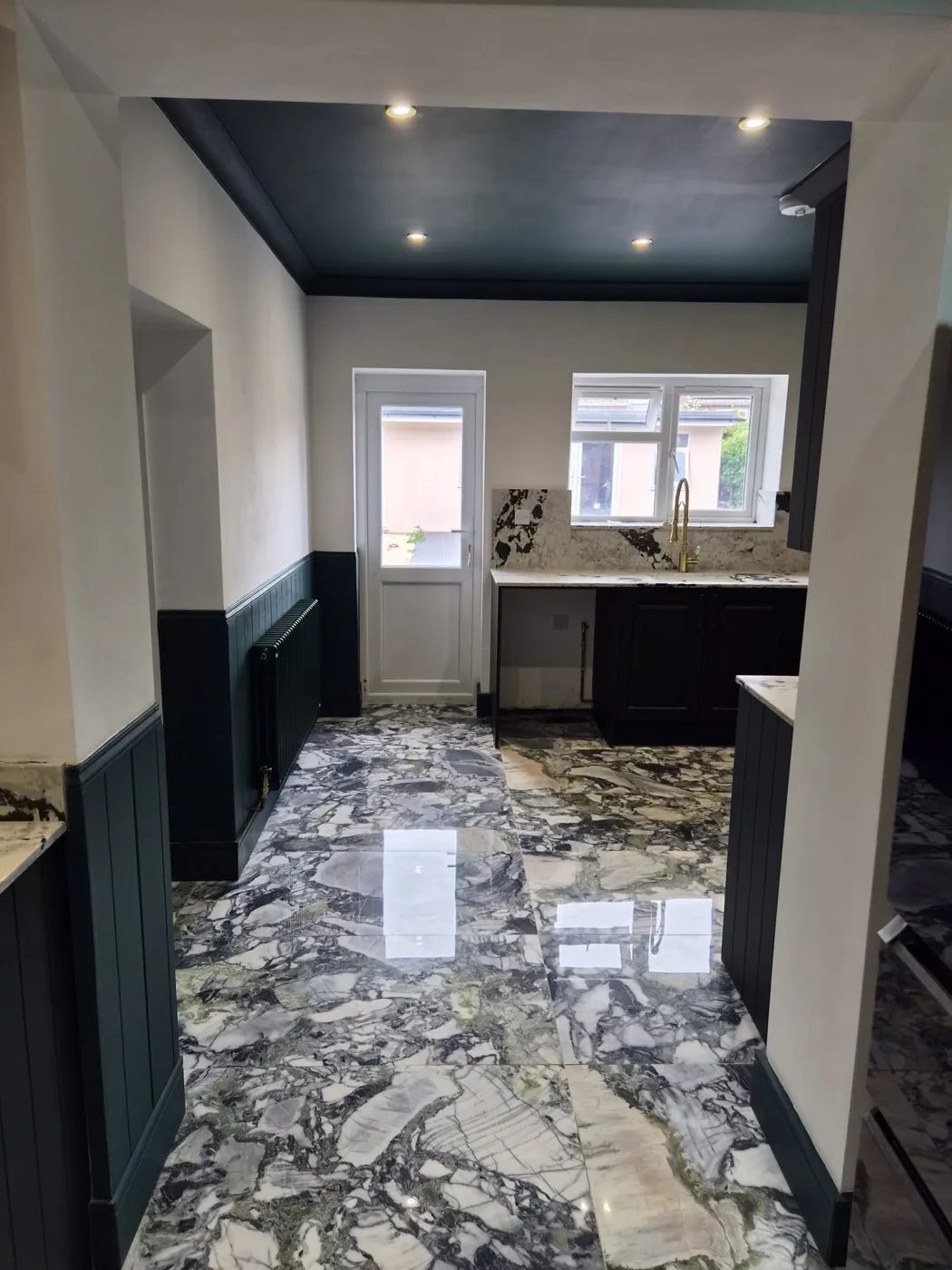 Marble hallway and kitchen after a builders clean