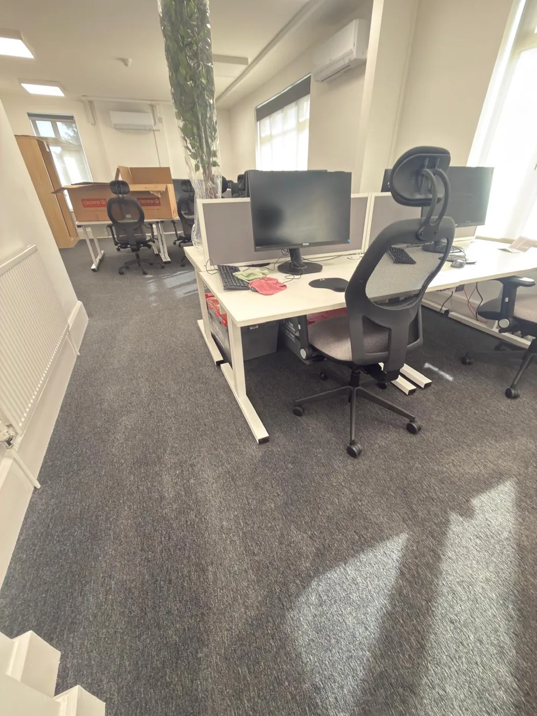 Office workstations and floor after commercial cleaning in Peterborough