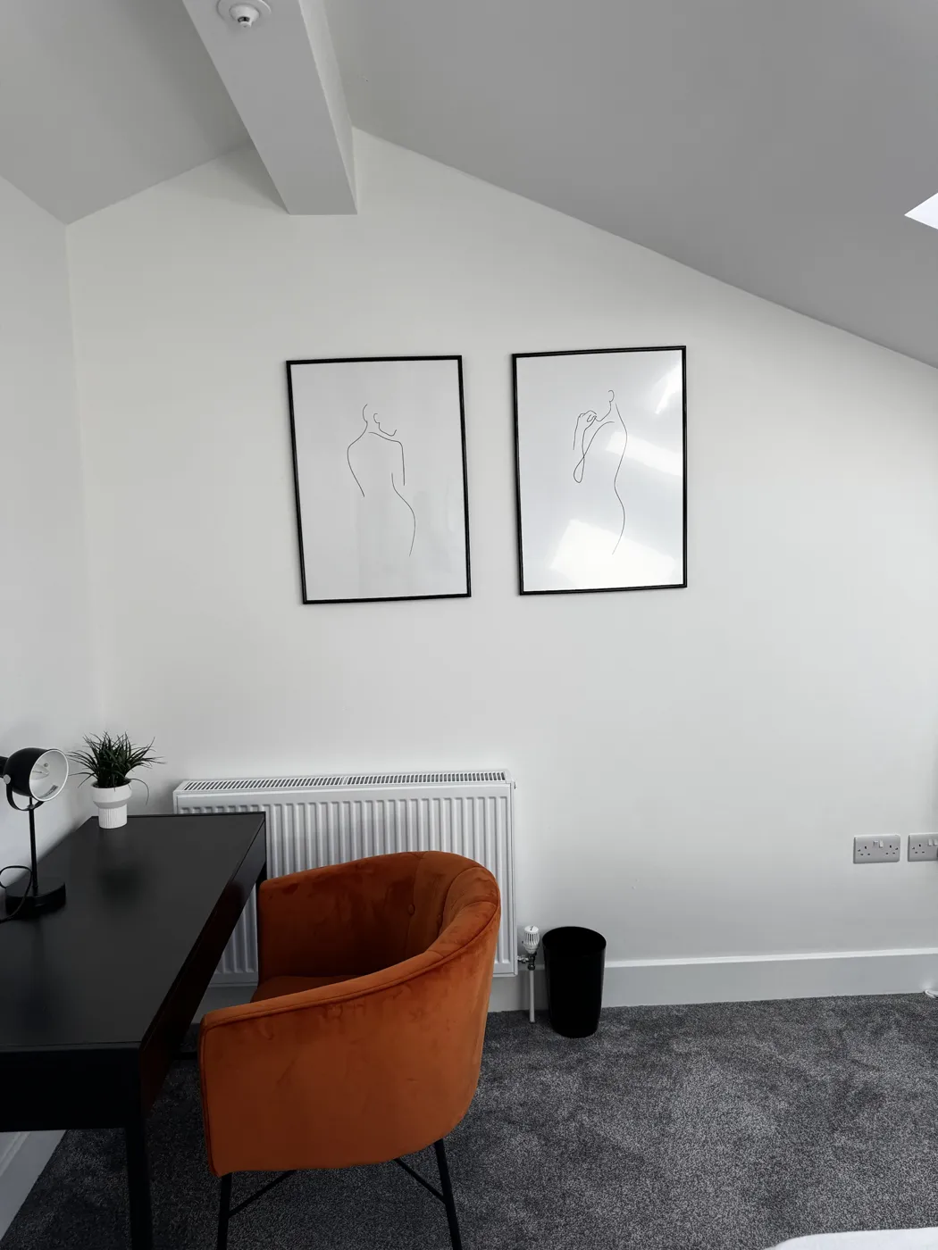 Short-let bedroom workspace cleaned