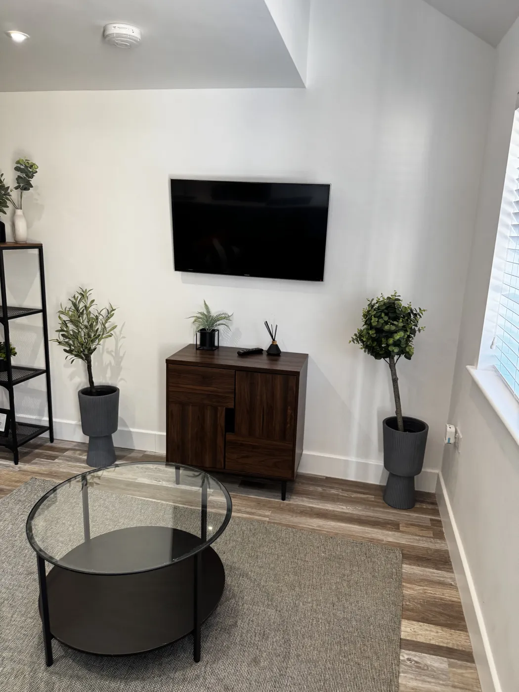 Short-let living room styled and cleaned between guests